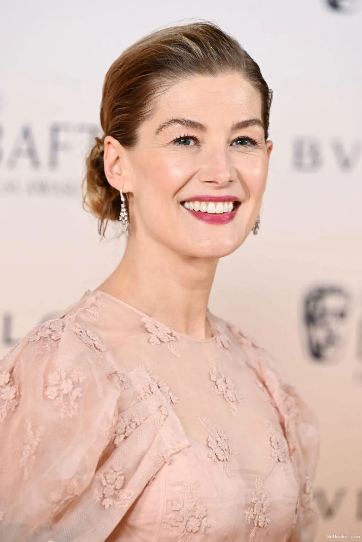 ROSAMUND PIKE at EE Bafta Film Awards 2024 Nominees Party in London 02 ...